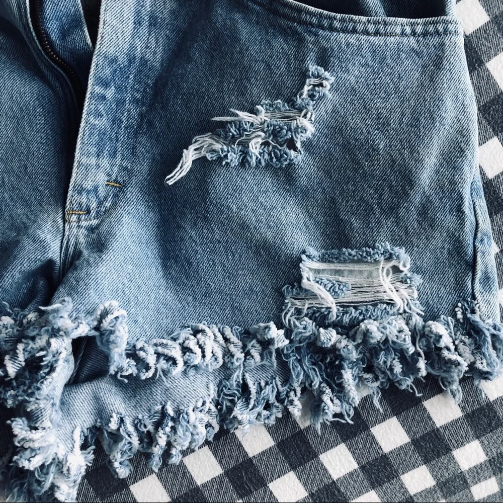 Lee Hand-made distressed denim shorts